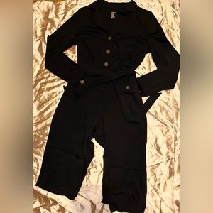Jumpsuit with turtle shell buttons and collar
